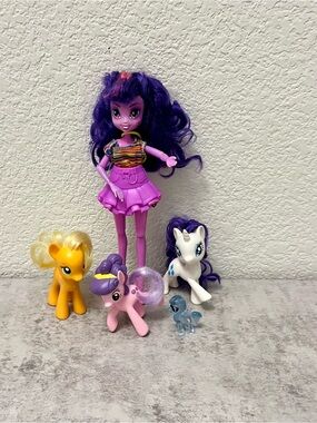 My Little Pony Purple-Haired Doll with Pink, White, Yellow, Blue Pony Figures